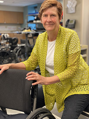 Cindy Smith with a wheelchair
