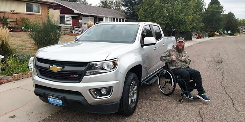 Perrin Nicolson with his truck
